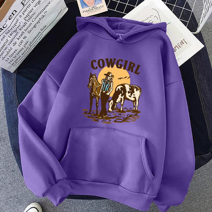 The Cowgirl And Her Cow And Horse Live In The West Hoodies