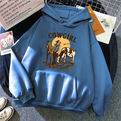 The Cowgirl And Her Cow And Horse Live In The West Hoodies