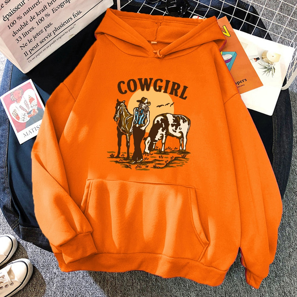 The Cowgirl And Her Cow And Horse Live In The West Hoodies