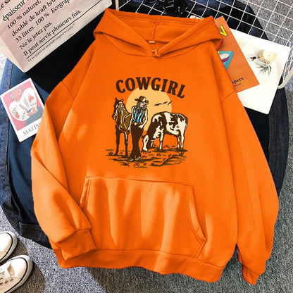 The Cowgirl And Her Cow And Horse Live In The West Hoodies