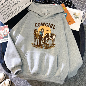 The Cowgirl And Her Cow And Horse Live In The West Hoodies